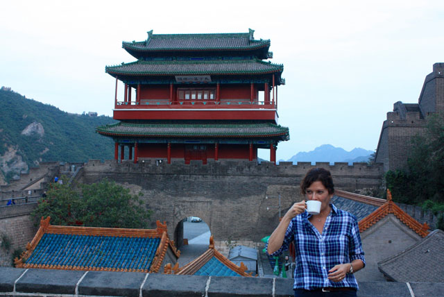 Shari Moss - drinking coffee at a temple in Asia
